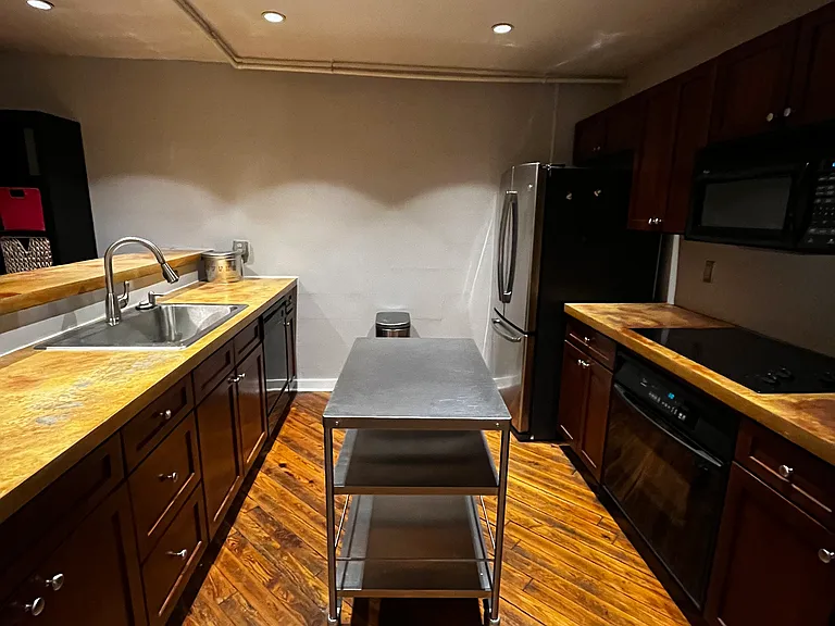 Kitchen with refridgerator (GE), oven, stove, and dishwasher (Whirlpool)