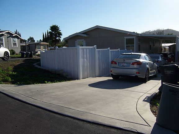 LONG DRIVE WAY WITH CARPORT