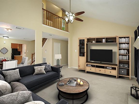 THIS IS SUCH A LARGE ROOM...GREAT FOR ENTERTAINING! IT IS ACTUALLY A FAMILY ROOM/DINING ROOM COMBINATION SO IT CAN BE DECORATED AS SUCH OR DECORATED AS A LARGE FAMILY ROOM! THE HIGH CEILING ADDS MORE SIZE AND CHARACTER TO THE ROOM!!
