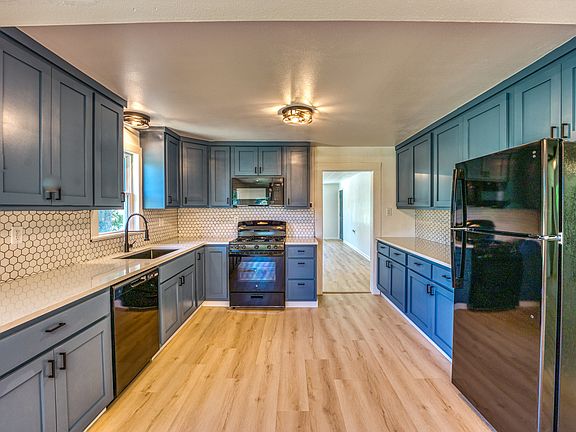 Kitchen looking into living room