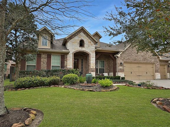 Welcome to 20107 Calliope Knolls Dr. in the highly desirable GATED section of Northlake in Gleannloch Farms!!!