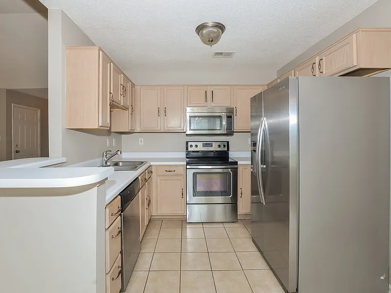 6967 Naples Dr — Photo 8