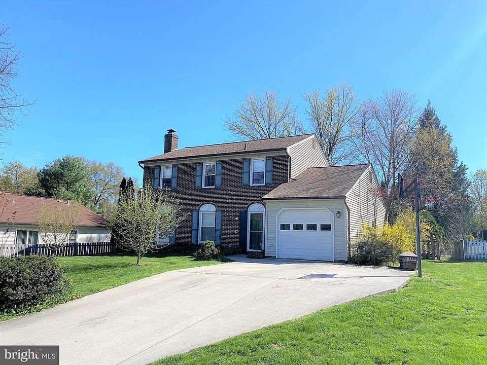 Lovely brick front colonial with 1 car garage