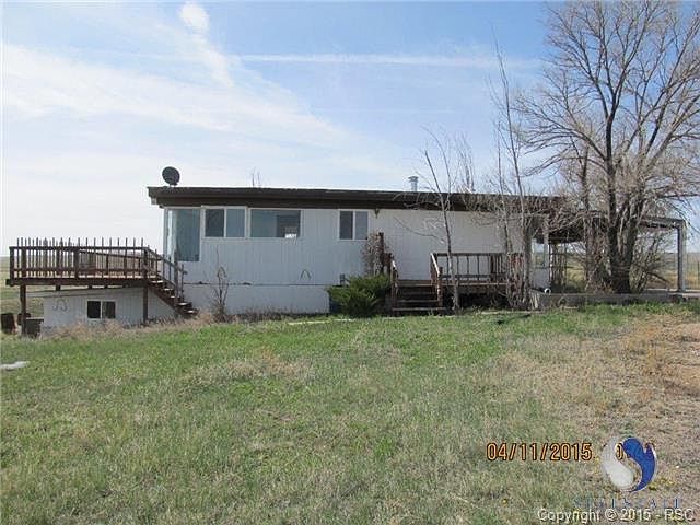 Side view of home with back deck.