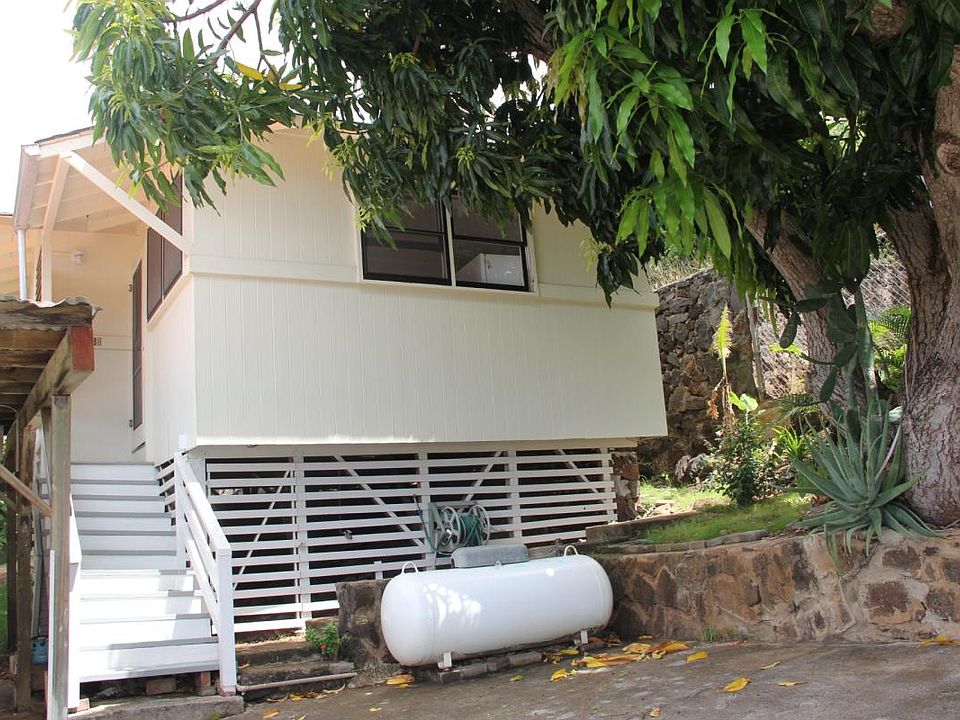 located at top of driveway