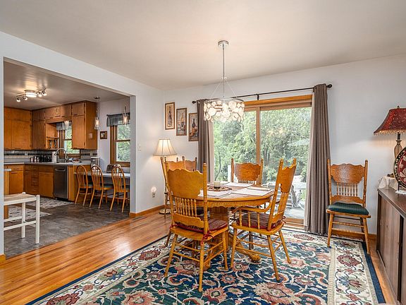 Dining area flows into kitchen and sliders to new deck. Bird and squirrel watching is a treat!