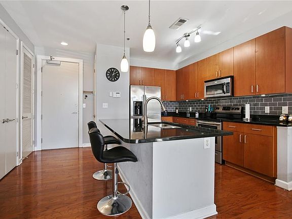3rd image of 711 Cosmopolitan Dr NE Unit Tl8