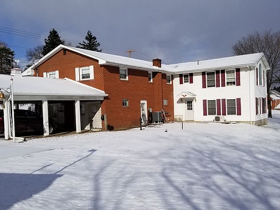 Carport, side and back