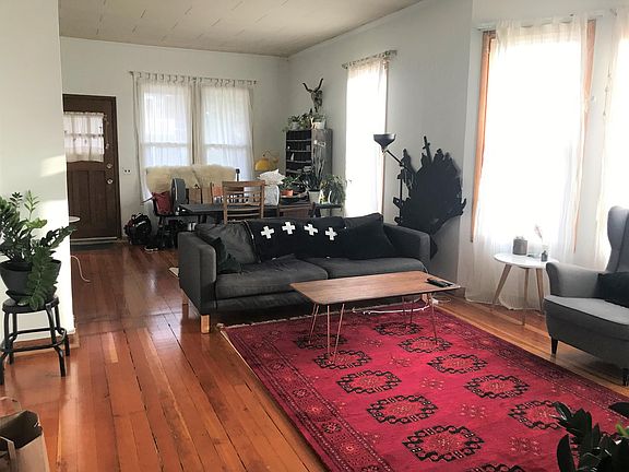 Living Room and Dining Room combo. (Picture taken facing front of house.)