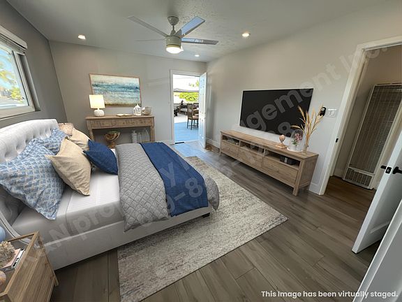 Main bedroom with access to large deck and in suite bathroom