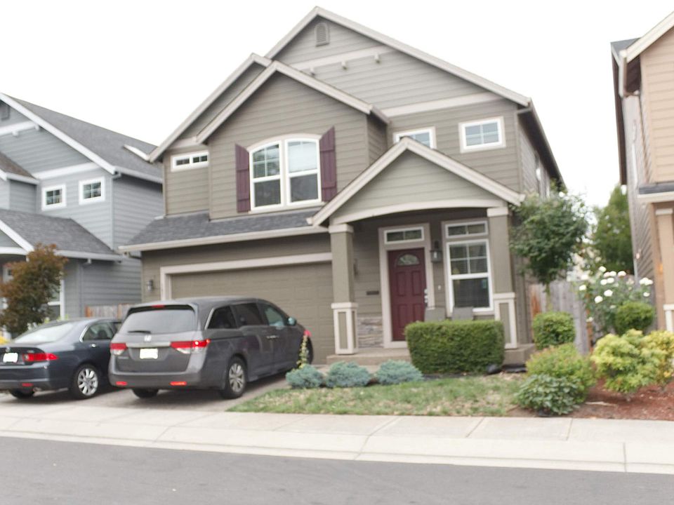 Front view with 2 car parking