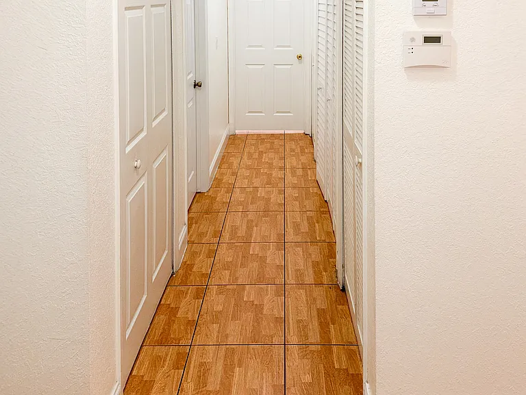 Hallway to bedrooms and bathrooms