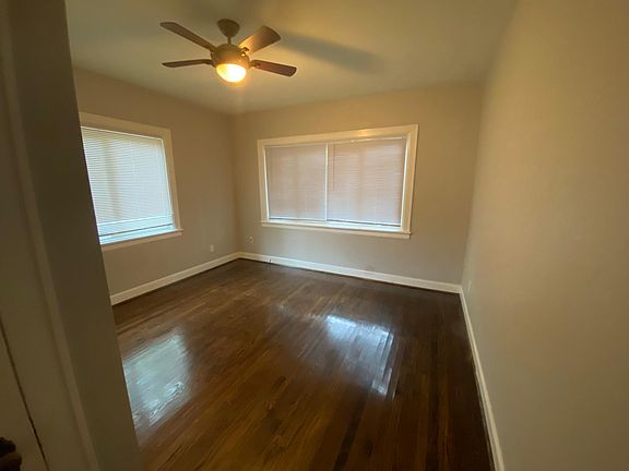 One of three large bedrooms