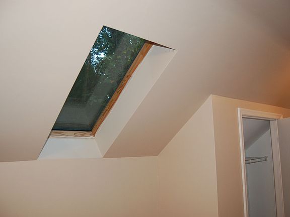 lg Bonus Rm; sky light;  above garage with intake for a/c & Heat