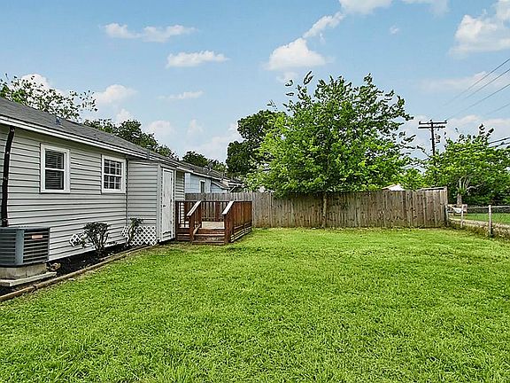 large back yard view from storage shed