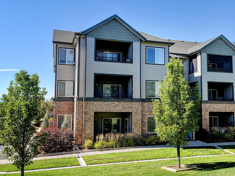 Well maintained lawns and landscaping around Michael Place Apartments