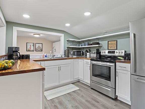 Fully stocked kitchen with drip coffee maker, blender, pots, pans, seasonings, etc. All your kitchen needs are here.