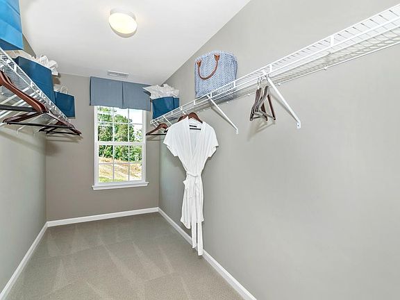 Large walk-owners closet.