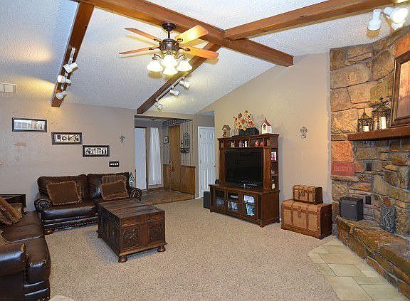 Large living space with a fireplace 