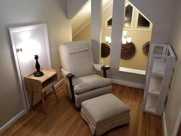 2nd floor reading nook with a beautiful view to first floor 2-story addition.
