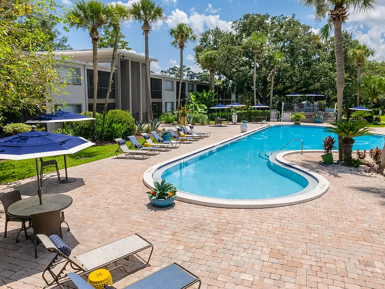 Dive into luxury with our resort-style pool and expansive sundeck, a vibrant haven for relaxation.