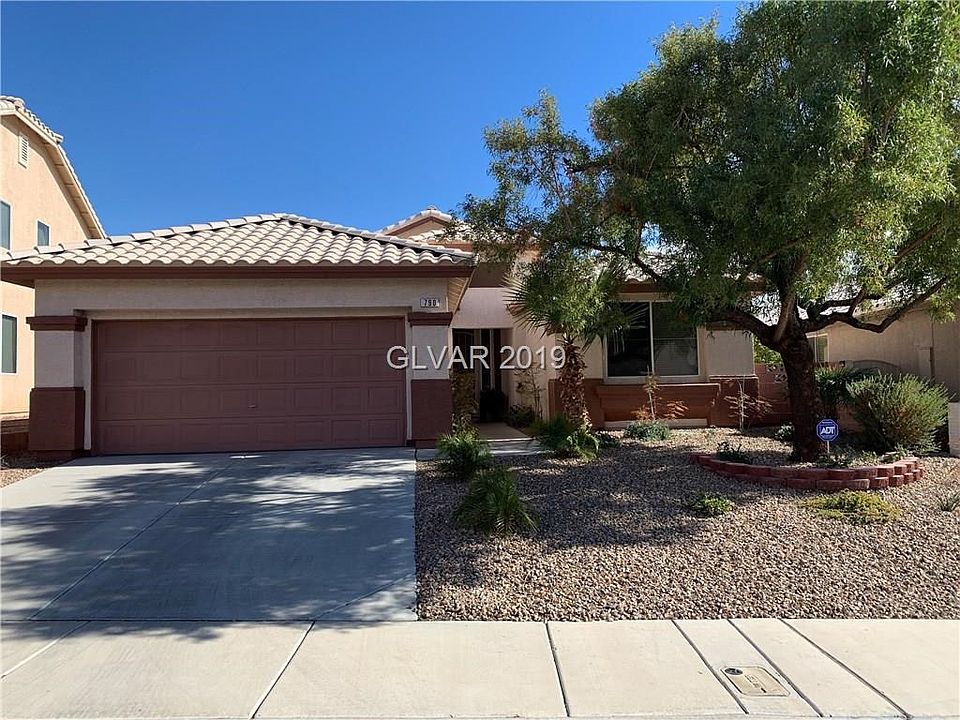Beautiful Palm Hills home...Low maintenance landscape...Exterior was recently painted...