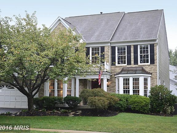 Beautifully landscaped corner lot awaits you..