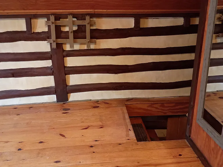 Bedroom, looking at top of stairs.