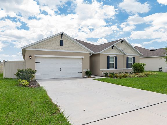 large driveway & 70' wide lot