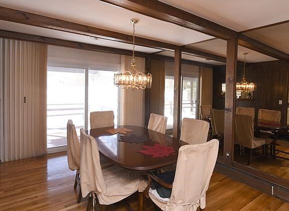 The formal dining room features hardwood floors.