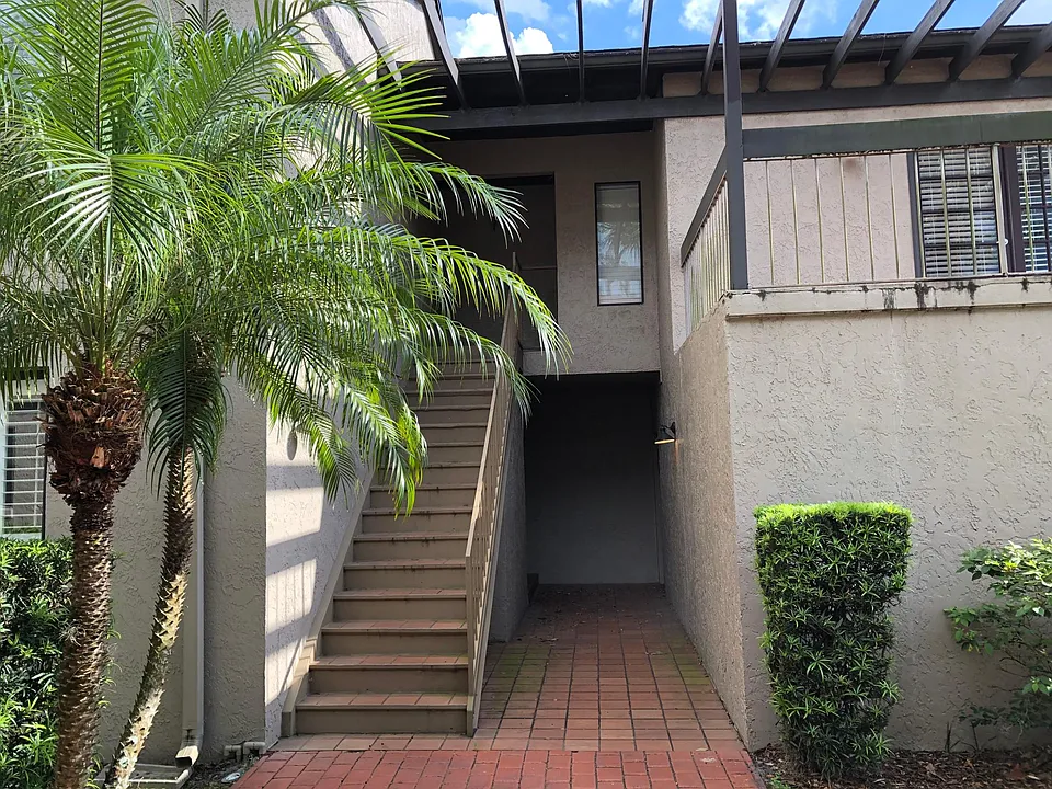Entrance on Side, Garage has back exit to lower walkway