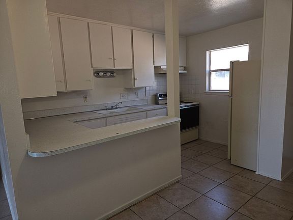 3rd image of 703 E 3rd St #703-B-204