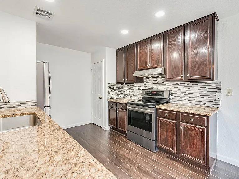 12825 Sexson Ridge Cv — Photo 6