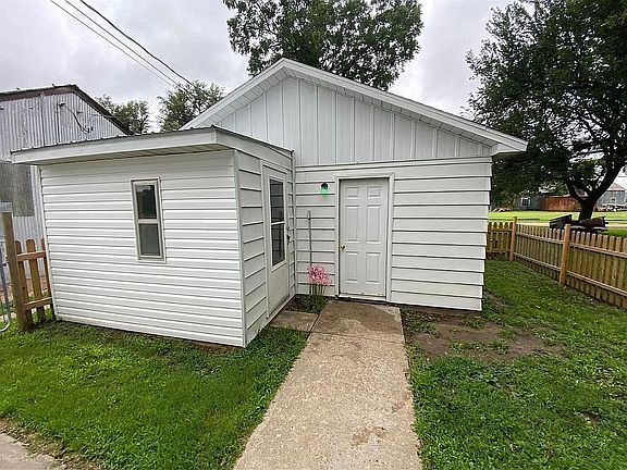 Garage with attached shed