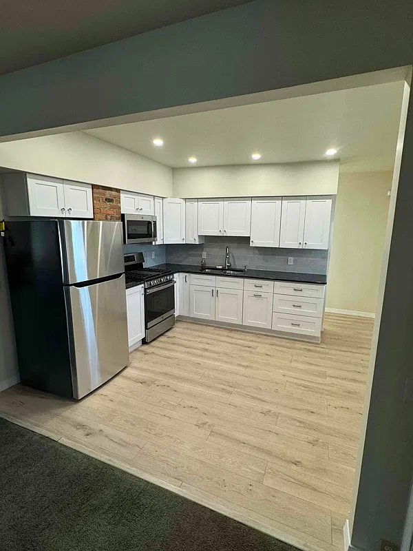 Updated Two Bedroom First Floor Unit on Expansive Lot — Photo 1