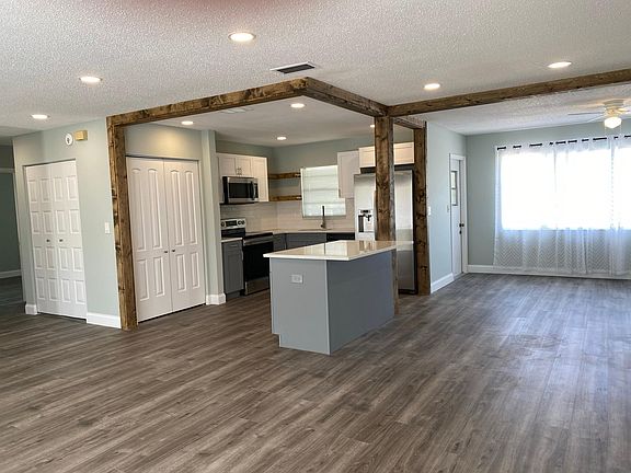 Kitchen with quartz countertops.