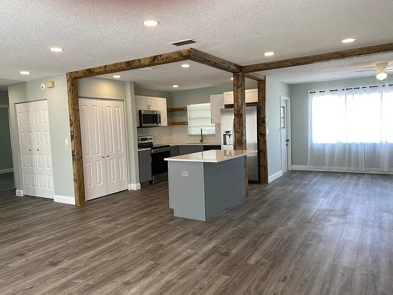 Kitchen with quartz countertops.