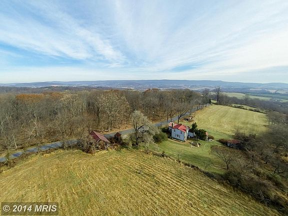 12.75 acres of farm land and woods