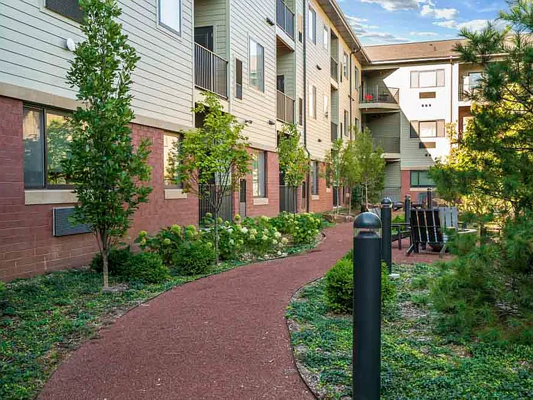 Meandering pathways and lush greenery make our courtyard a perfect place for a peaceful stroll or a quiet moment outdoors.