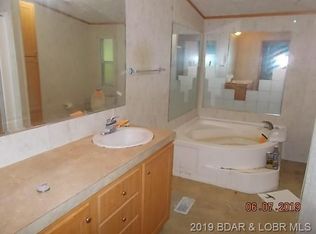 42 McQueen Ln, Macks Creek, MO 65786