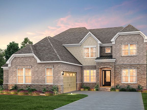 Harrington Exterior 8 features Brick, Stone, Shakes and Covered Front Door