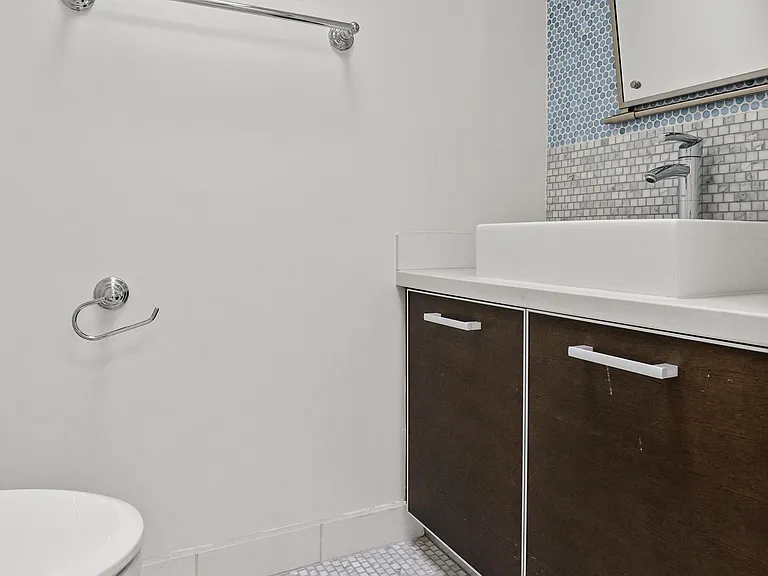 Spacious Bathroom with Double-Cabinets for Storage