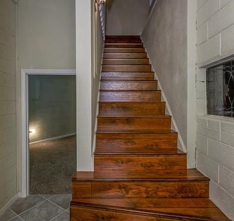 Main stairs and 3rd bedroom