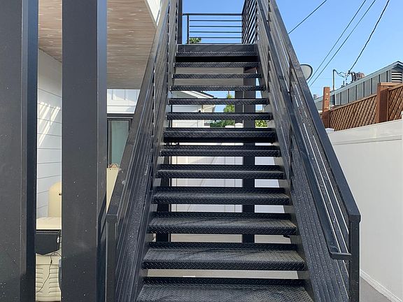 Steel stairs to unit