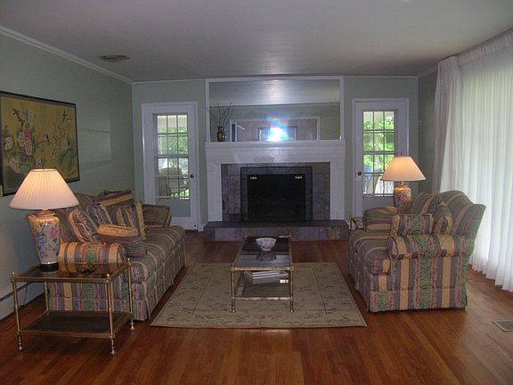 Living room opens to side porch
