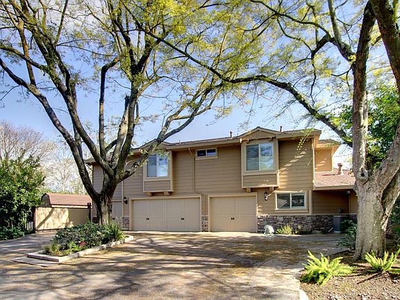 Side of house, 4 car garage plus room for a trailer or RV