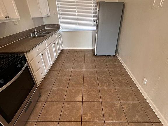 3rd image of 12624 S Wilmington Ave #12700-8