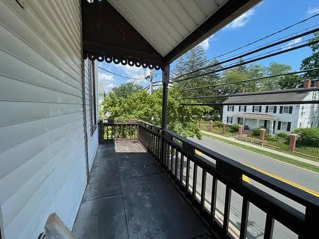 Private balcony overlooking Main St. in the Village of Lawrenceville