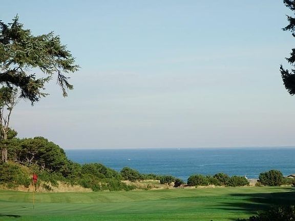 View over fairway to surf