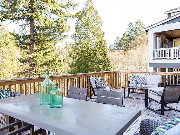 Enjoy nature all around on the comfortable deck with room for multiple seating areas